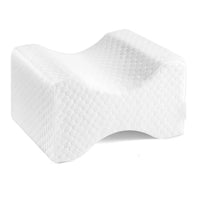 Coussin genoux ergonomique blanc en mousse à mémoire, profil creusé pour caler genoux et chevilles, housse texturée.